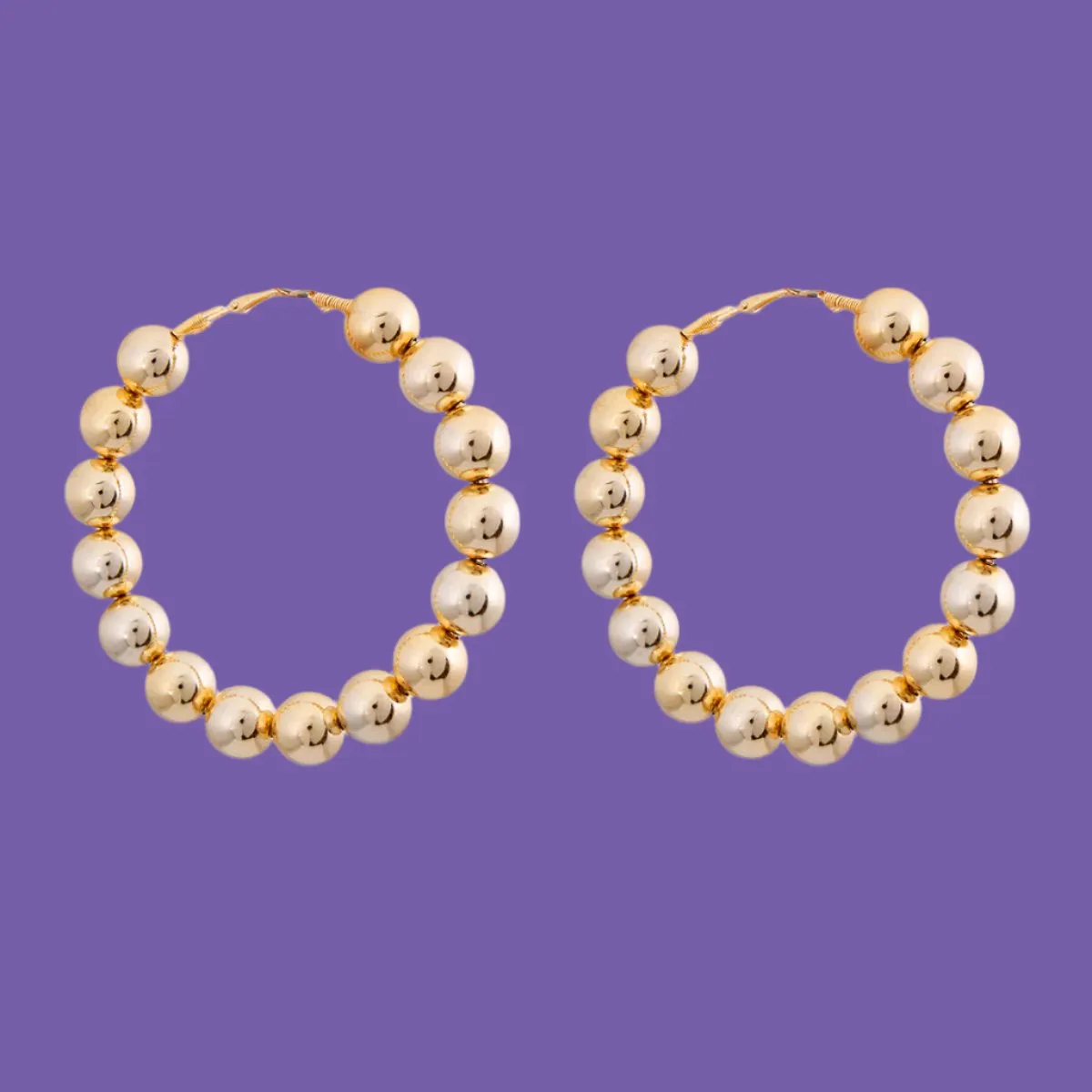 Elegant Gold Hoop Earrings with Bead Details