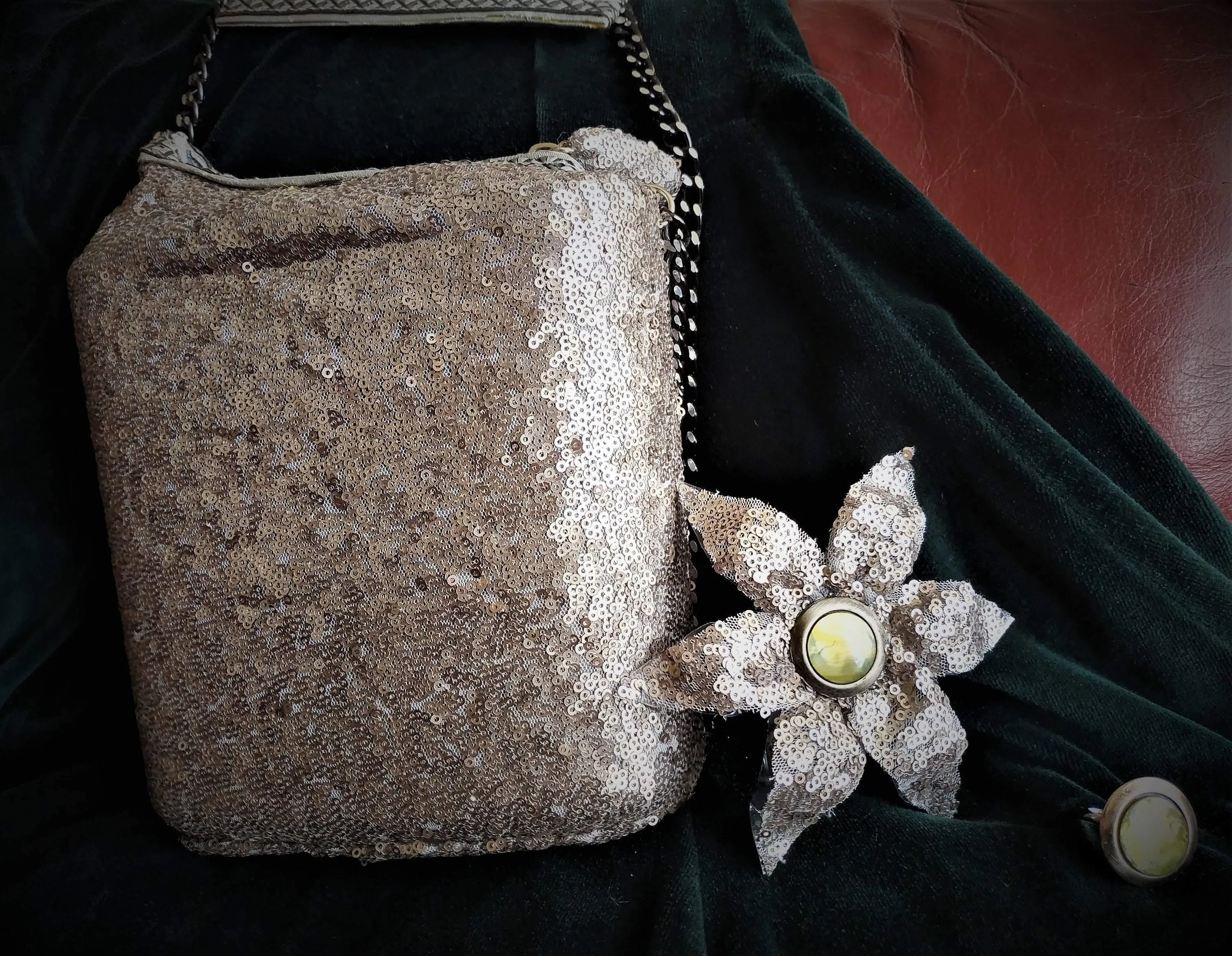 Exclusive handmade silver asymmetric box-bag has sequins on